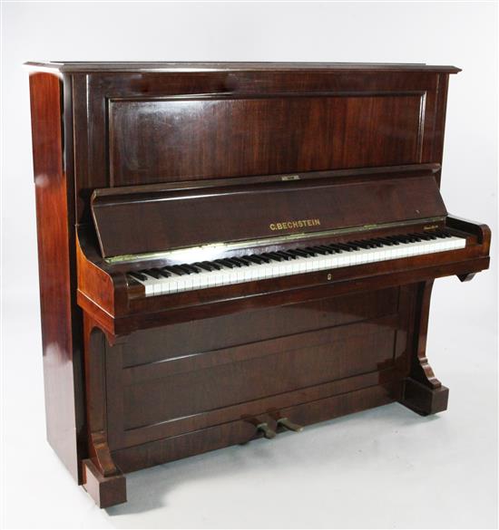 A Bechstein rosewood cased upright piano, c.1909, W.4ft 10in.